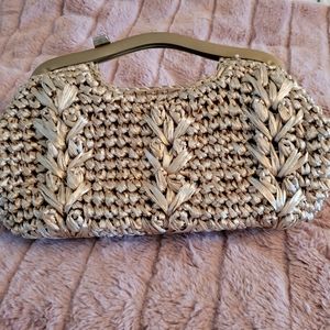 Woven straw vintage style clutch in neutral shade